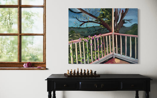 Painting of a balcony with trees and a window, displayed on a wall above a chessboard.