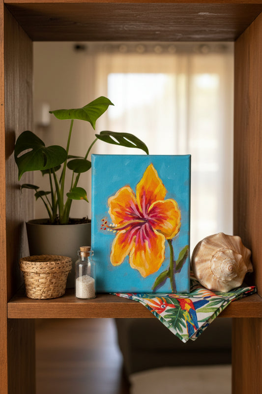 Painting of a yellow flower on a blue background held in front of green foliage.