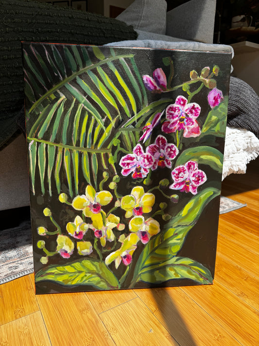 Painting of flowers and leaves on a wooden surface