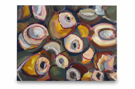 Abstract painting with colorful circular shapes held by a hand.
