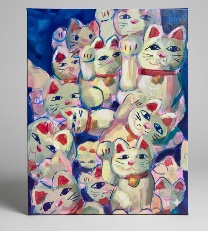 Artistic depiction of multiple waving cats with colorful backgrounds