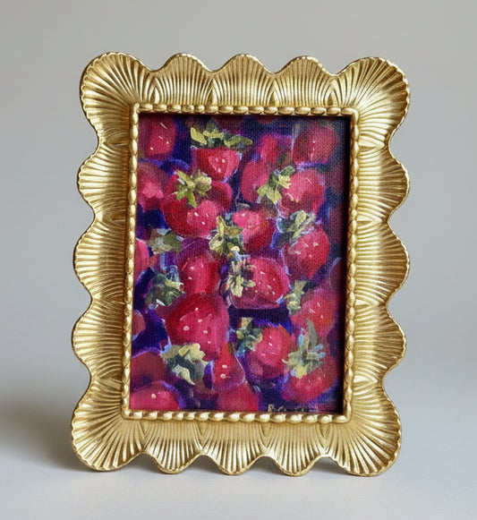 Framed artwork of strawberries