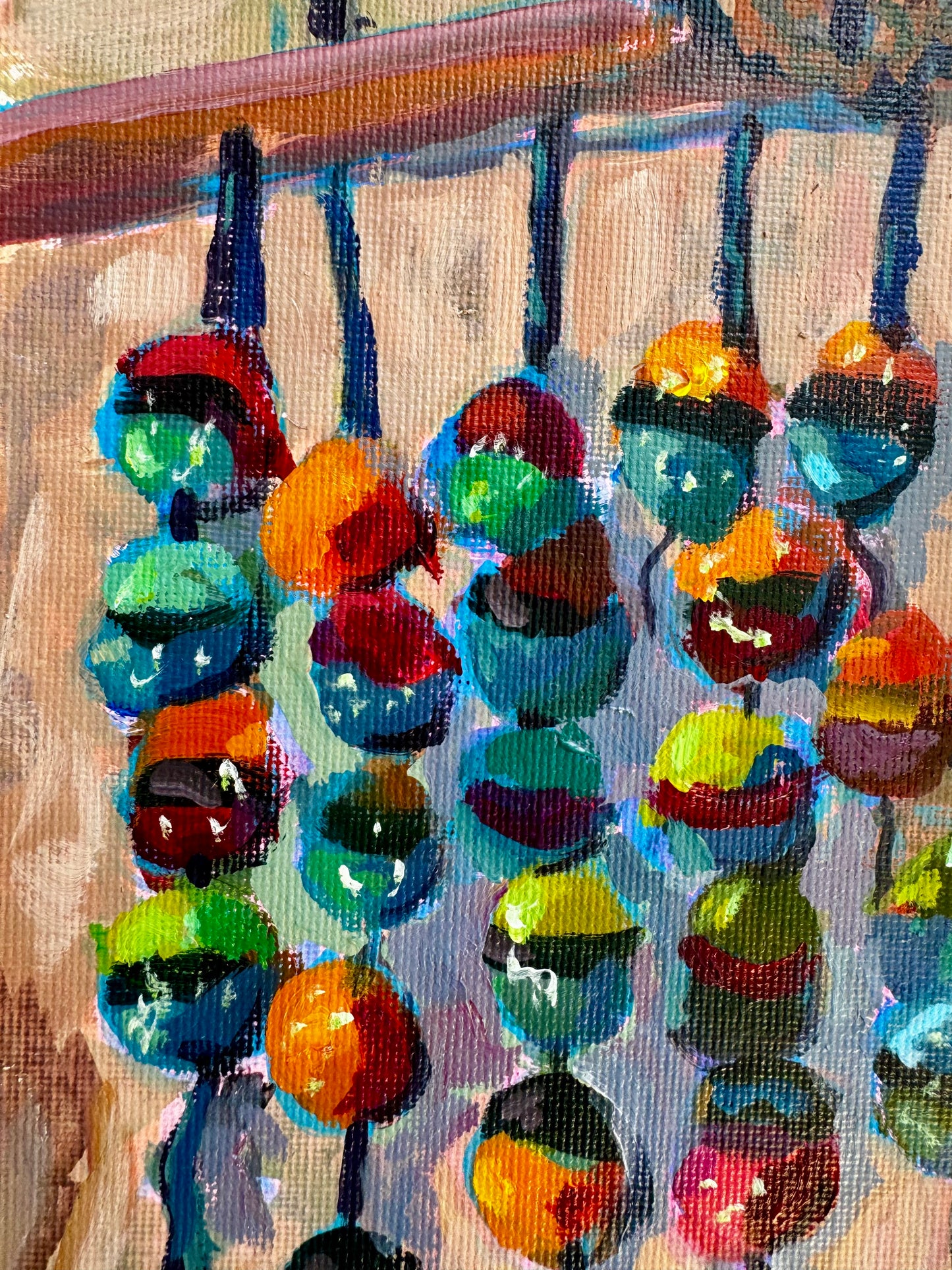 Colorful floats hanging on a line with a wooden background