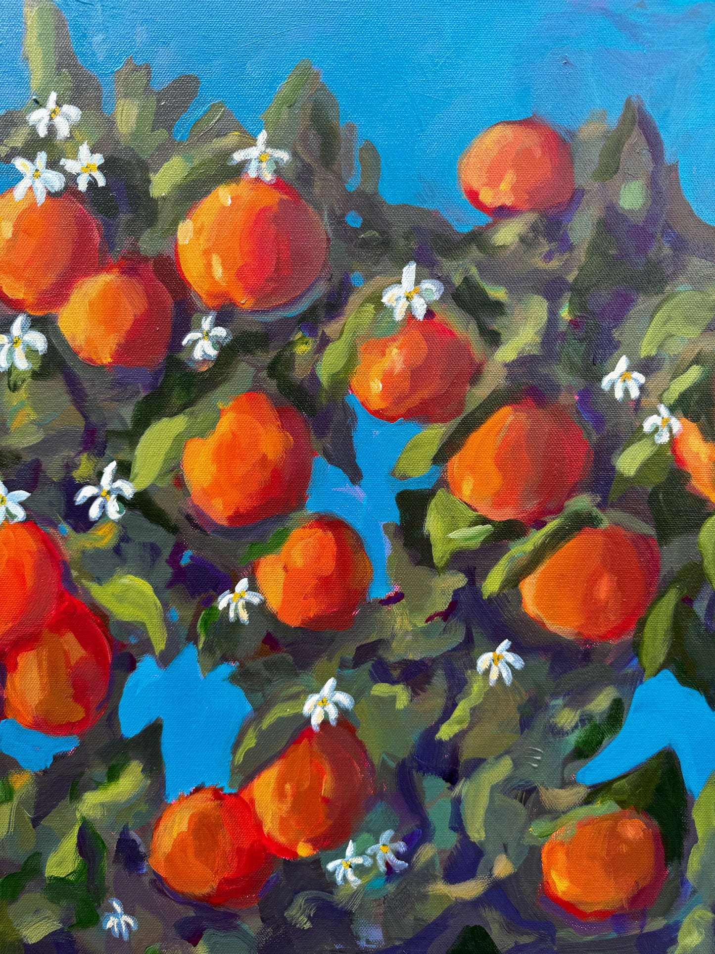 Painting of a fruit tree with red fruits and green leaves against a blue background