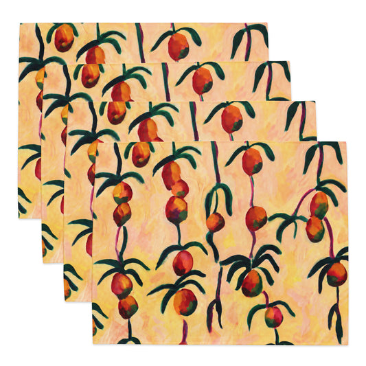 Four rectangular placemats with a repeating pattern of hanging orange fruits and green leaves on a warm yellow background, arranged in a staggered stack on a white background.