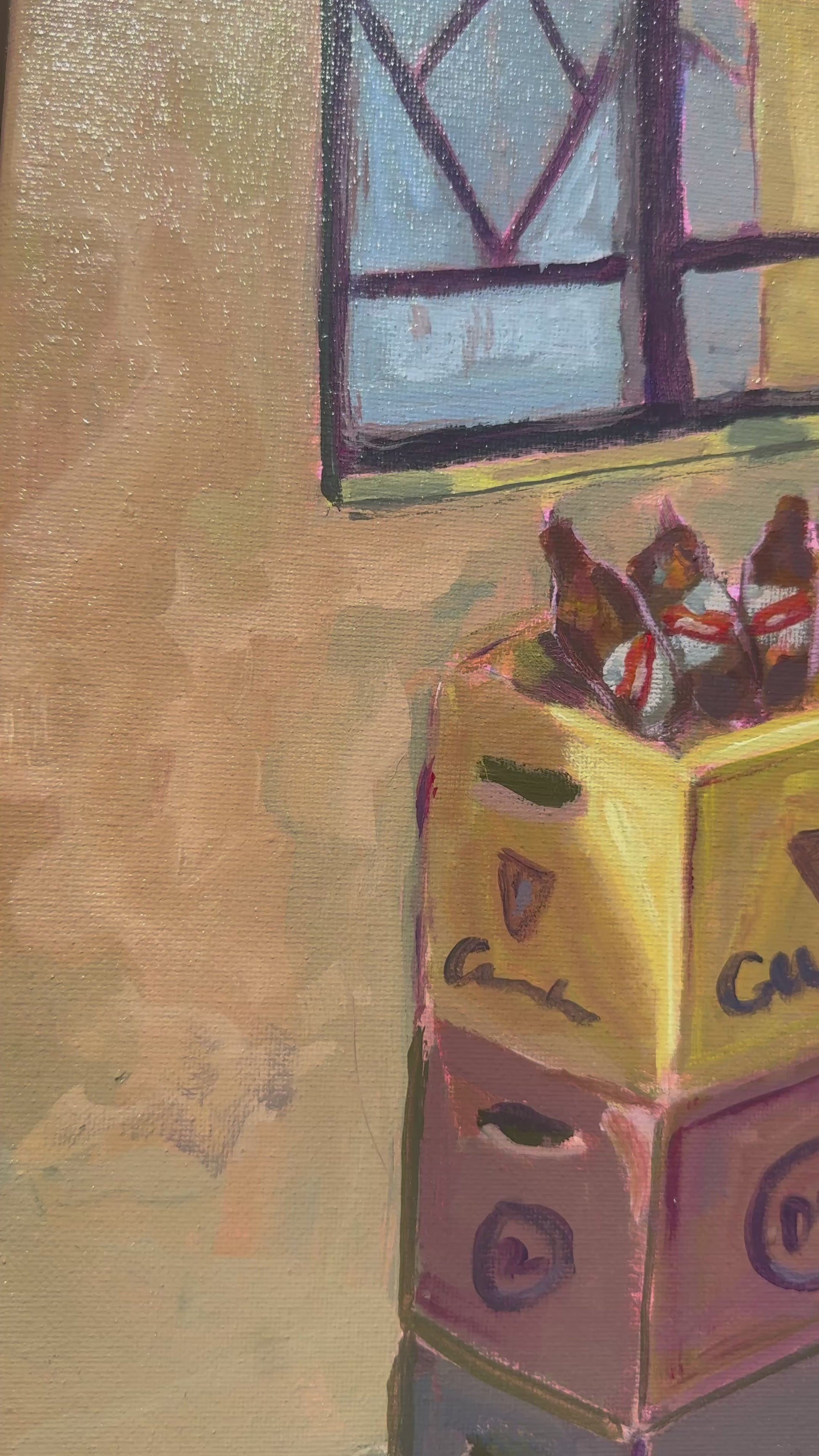 video of painting of crates on a floor with a window and water bottle framed the painting is on a wooden background